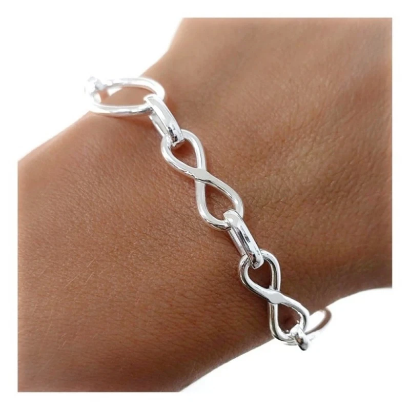 Pulsera Plata Ley 925m motivo infinitos 20 cm. asas huecas.