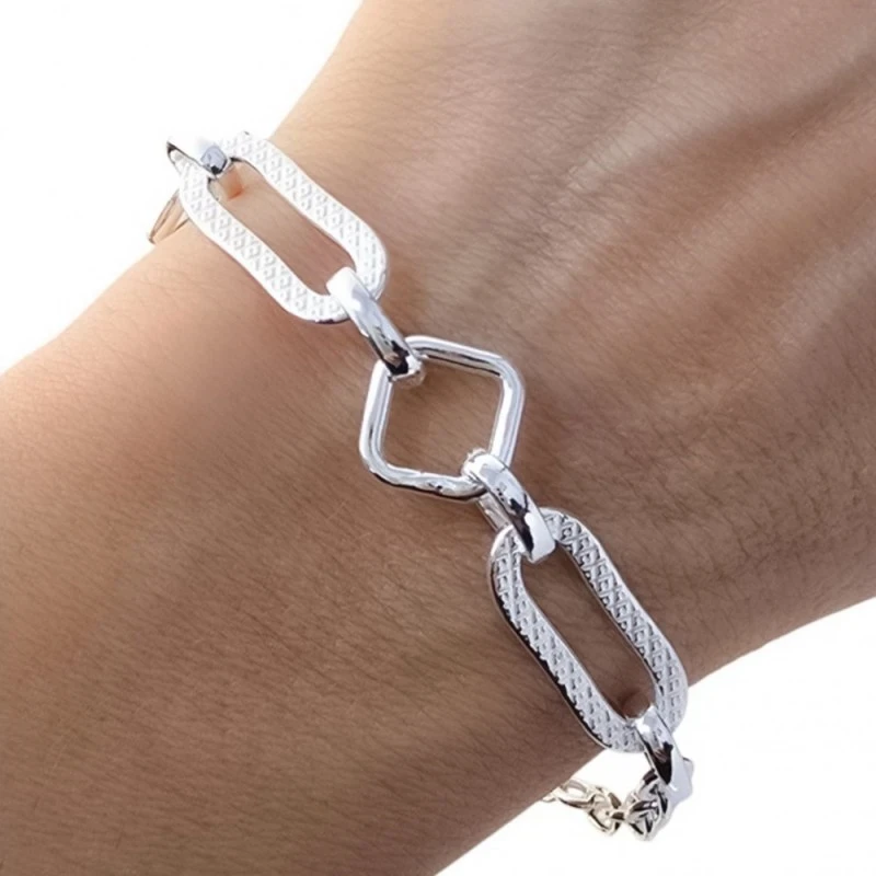 Pulsera Plata Ley 925m 19 cm. eslabones huecos ovalados dibujo 21 x 8