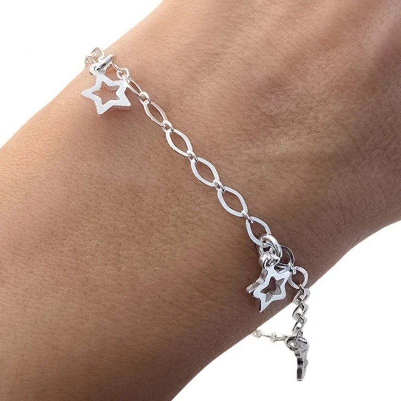 Pulsera Plata Ley 925m 17 cm. asas ovaladas 3 mm. estrellas colgantes