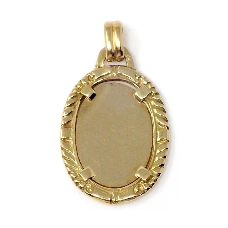 Chapa oro 18k ovalada 27mm. cerco tallado igual por ambas caras