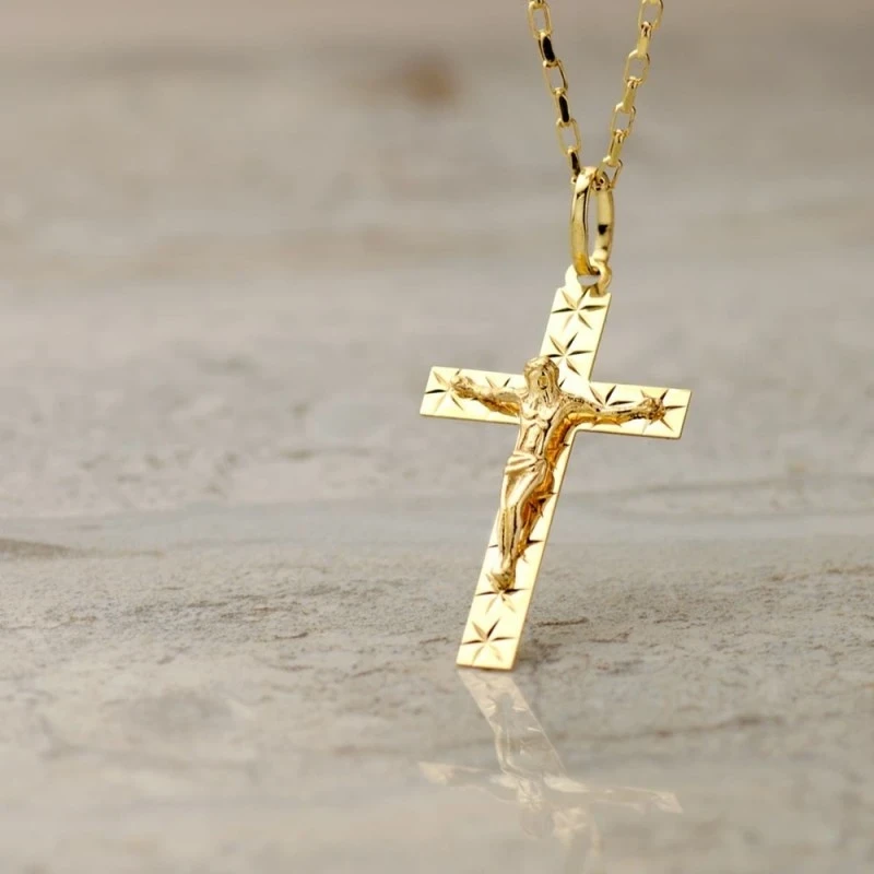 Cruz Cristo Colgante Oro 18k unisex 34 mm. estrellas talladas detalle