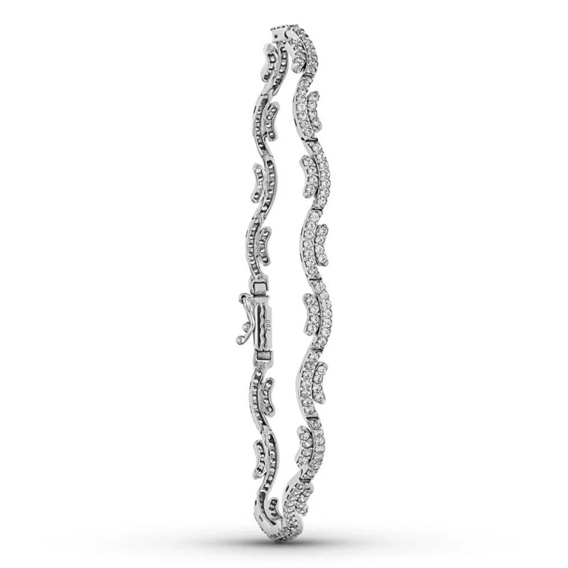 Pulsera Oro 18k blanco circonitas eslabones ondas