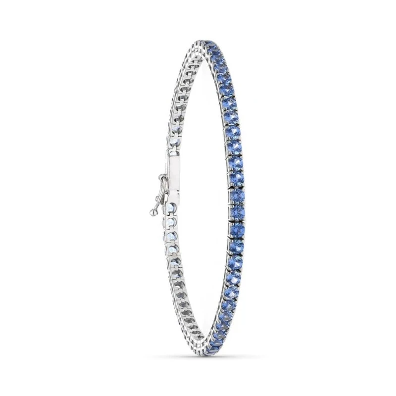 Pulsera Oro 18k blanco circonitas azules 19 cm.