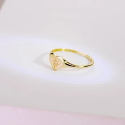 Sortija Oro 18k mujer cabeza forma corazón circonita centro lisa deta