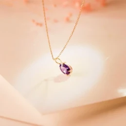 Colgante Oro 18k mujer 7 mm. piedra color amatista ovalada garras