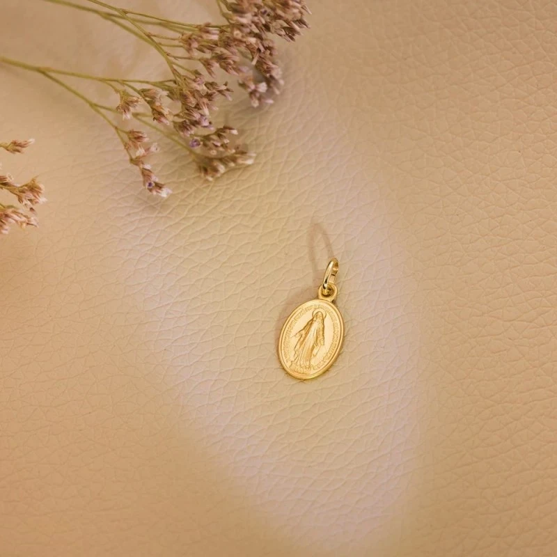 Virgen Milagrosa Medalla Oro 18k ovalada 14 mm.