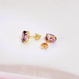 Pendientes Oro 18k mujer 7 mm. piedra amatista ovalada