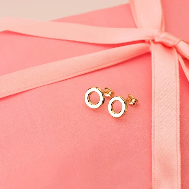 Pendientes Oro 18k mujer 9 mm. redodondos lisos calados