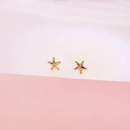 Pendientes Oro 18k mujer 7 mm. forma estrella sheriff circonita centr