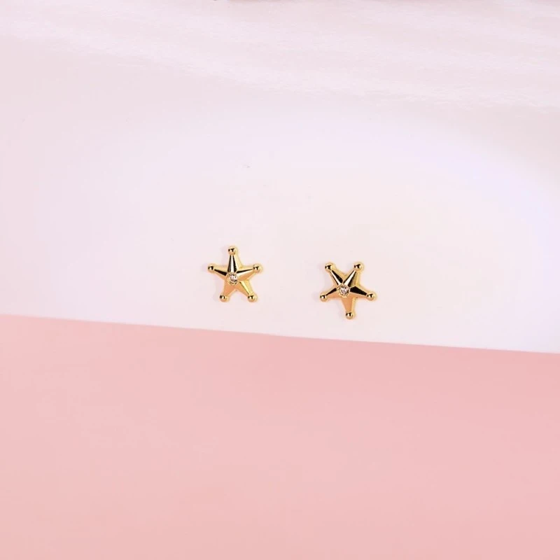 Pendientes Oro 18k mujer 7 mm. forma estrella sheriff circonita centr