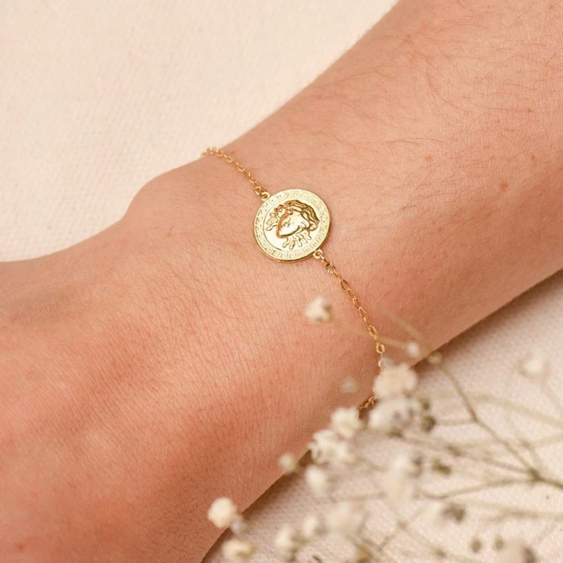 Pulsera Oro 18k mujer 18 cm. cadena tallada detalle medusa greca 12 m