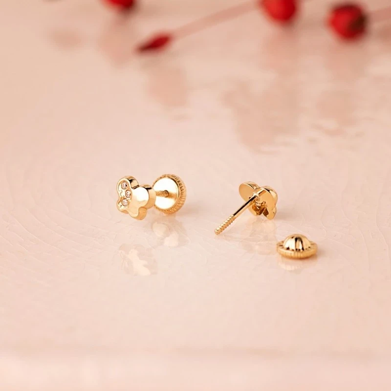 Pendientes Oro 18k niña 5.5 mm. forma mariposa circonitas combinada l