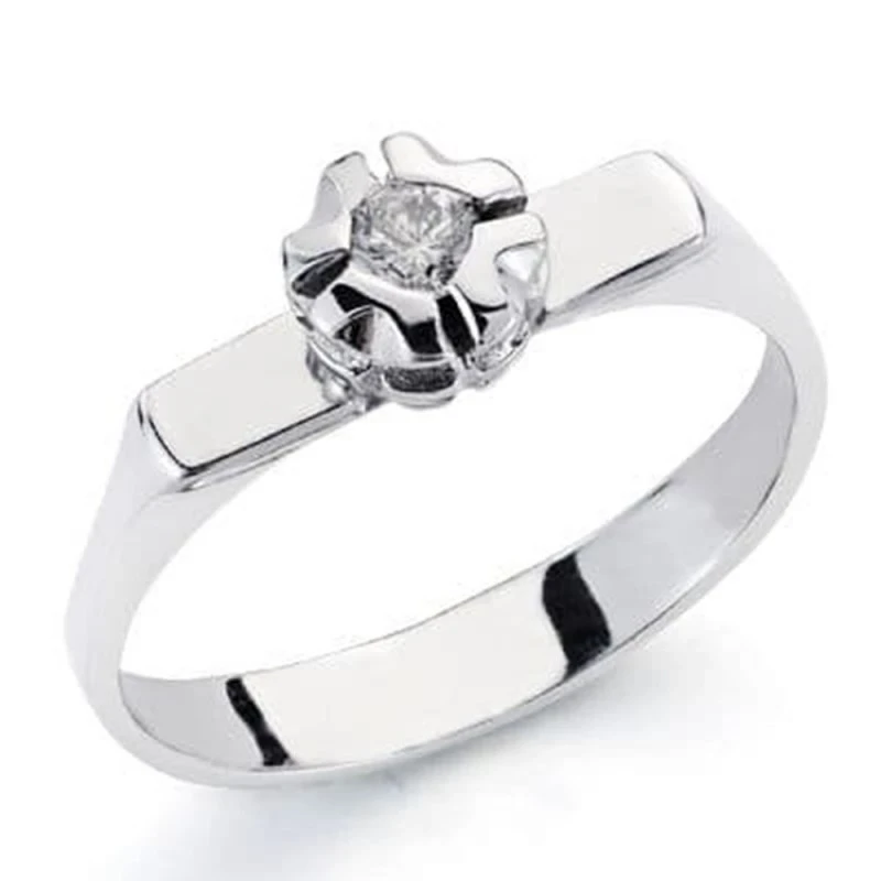Sortija Oro Blanco 18k mujer diamante centro 0.10ct. cabeza forma flo