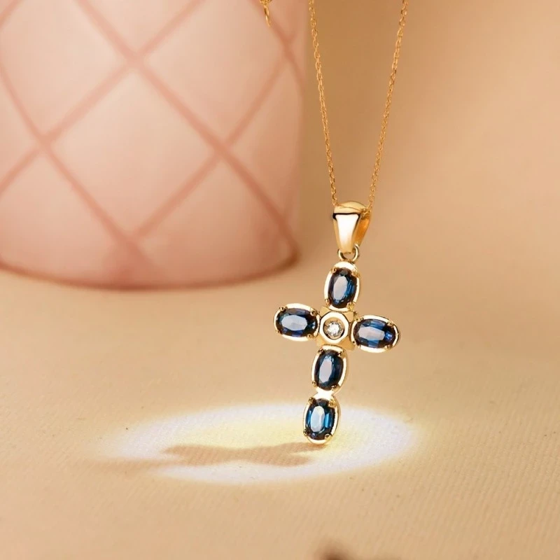 Cruz Colgante Oro 18k mujer 30 mm. diamante centro 0.045ct. combinado