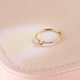 Sortija Oro 18k amatista 3 mm. centro combinada 6 diamantes 0.005ct.