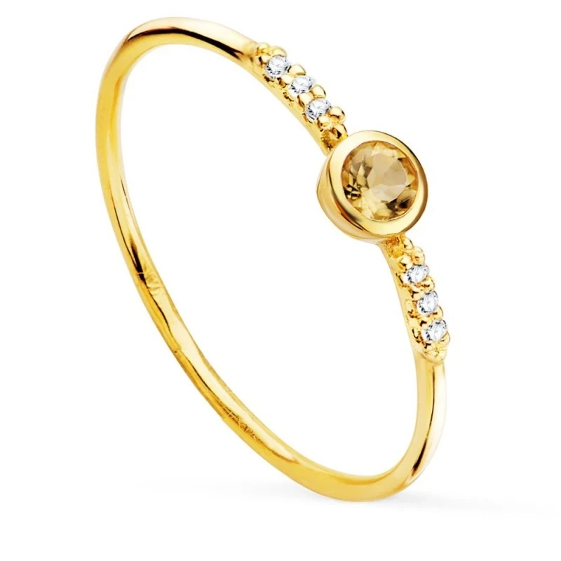 Sortija Oro 18k citrina 3 mm. redonda centro combinada 6 diamantes 0.