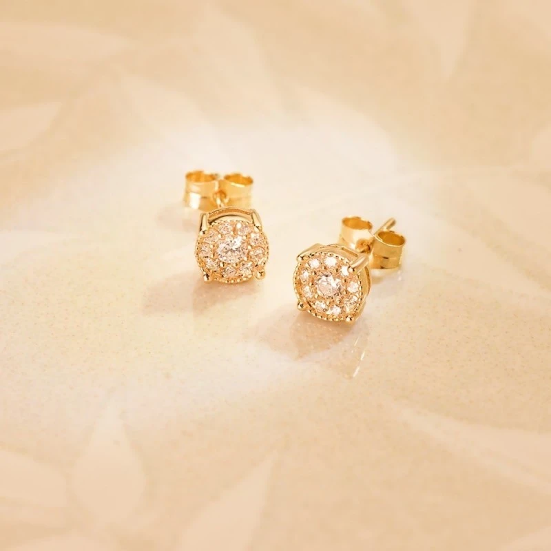Pendientes Oro 18k chatón 6.5 mm. 10 diamantes
