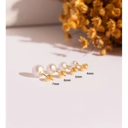Pendientes en Oro de 18k con perla de 7 mm.
