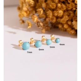 Pendientes en Oro de 18k con piedra turquesa de 5 mm. con garras