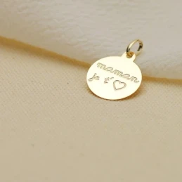 Colgante en Oro de 9k con 16 mm. con mensaje MAMA JE T´ más corazón