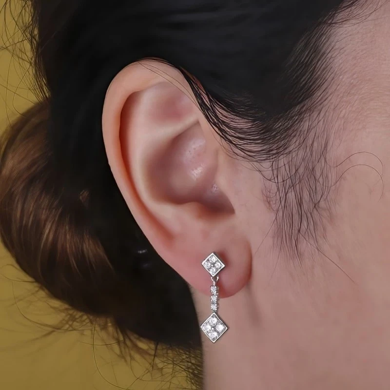 Pendientes largos oro blanco 18k mujer 23 mm. dos rombos circonitas c