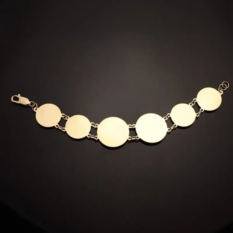 Pulsera oro 18k mujer 20.5 cm. medusas centro 25 mm. borde greca comb