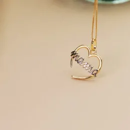 Colgante oro bicolor 18k mujer 15 mm. corazón calado abierto mensaje