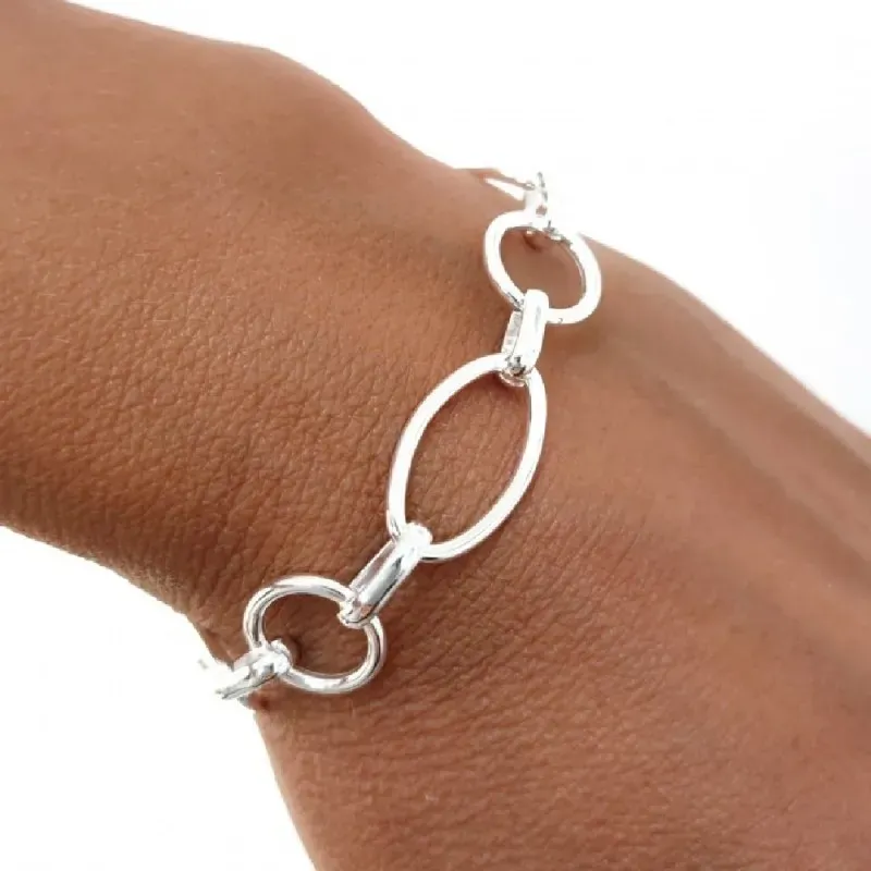 Pulsera plata Ley 925m mujer 19 cm. eslabones huecos formas combinada