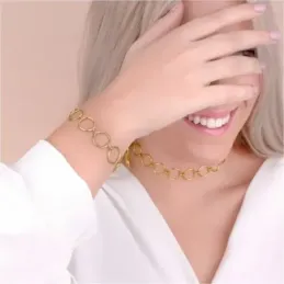 Pulsera Acero Inoxidable chapada oro 17 cm. aros calados lisos