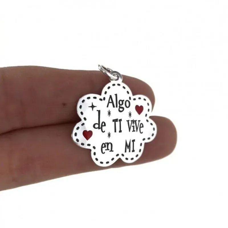 Colgante Plata Ley 925m uisex 25 mm. flor enamorados ALGO DE TI VIVE