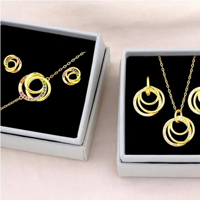 Pendientes Aros Plata Ley 925m chapados oro círculos lisos enlazados