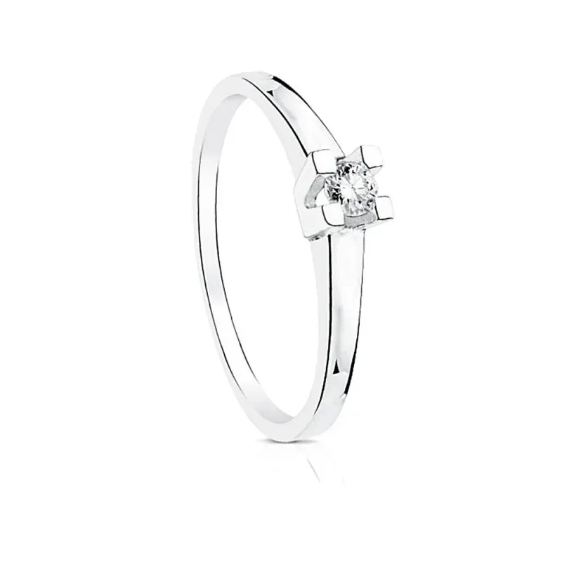 Solitario oro blanco 18k liso centro diamante 0.100ct. brillante garras