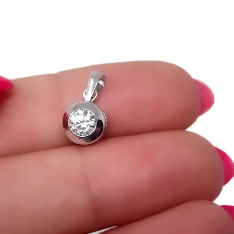 Colgante oro blanco 18k chatón 7mm. circonita [AA7317]