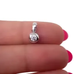 Colgante oro blanco 18k circular chatón circonita 5.5mm. [AB2865]