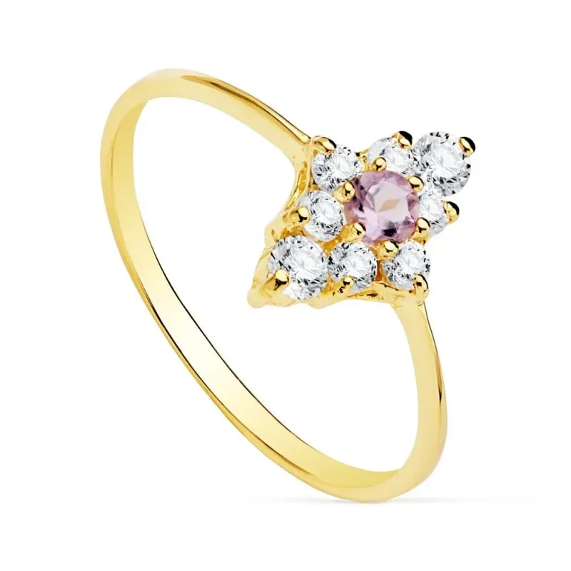 Sortija oro 18k forma lanzadera 11x8mm. centro piedra malva cuajo 10x7mm. circonitas