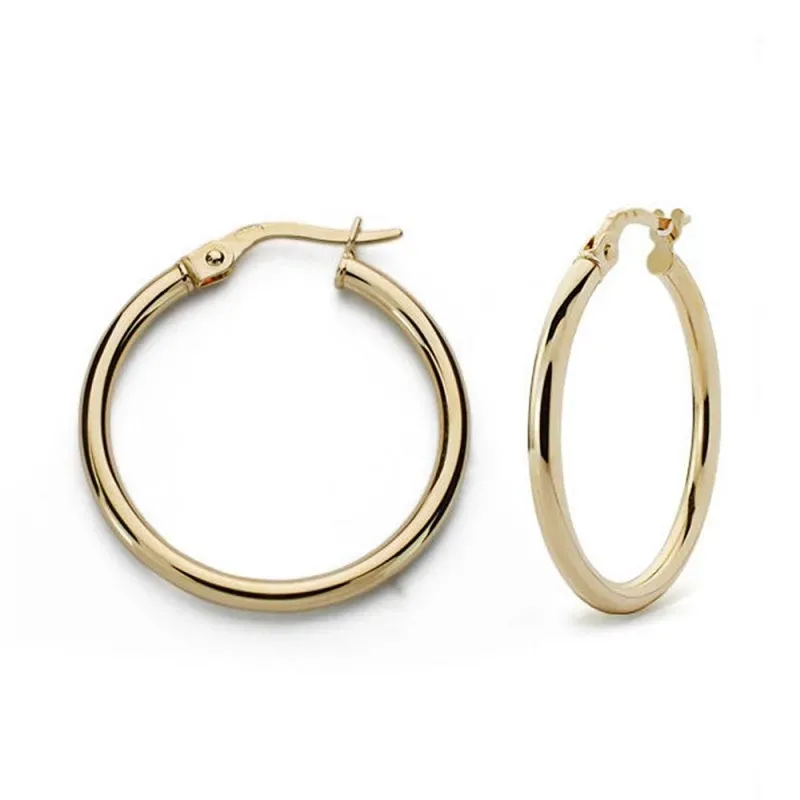Pendientes oro 18k aros 24mm. huecos lisos mujer