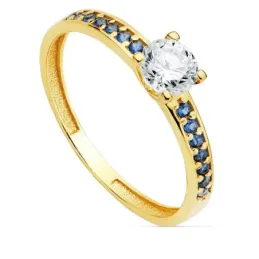 Solitario oro 18k carril piedras azules centro garra circonita 5mm. mujer