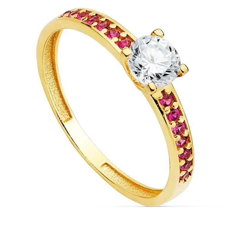 Solitario oro 18k carril piedras rojas centro garra circonita 5mm. mujer