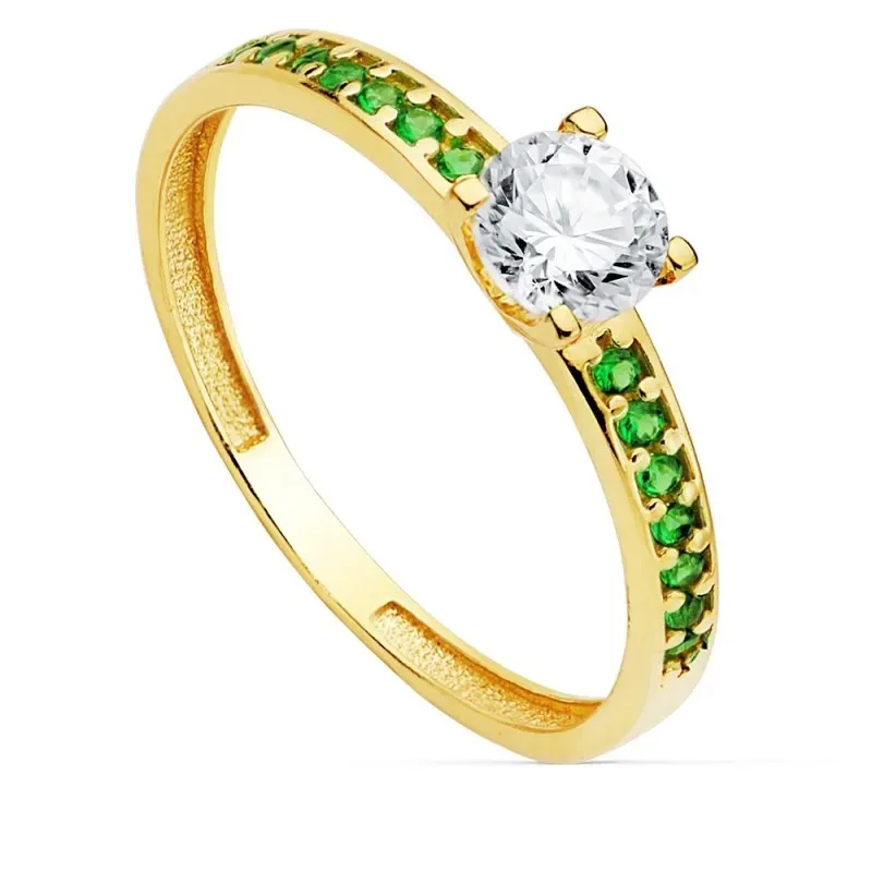 Solitario oro 18k carril piedras verdes centro garra circonita 5mm. mujer