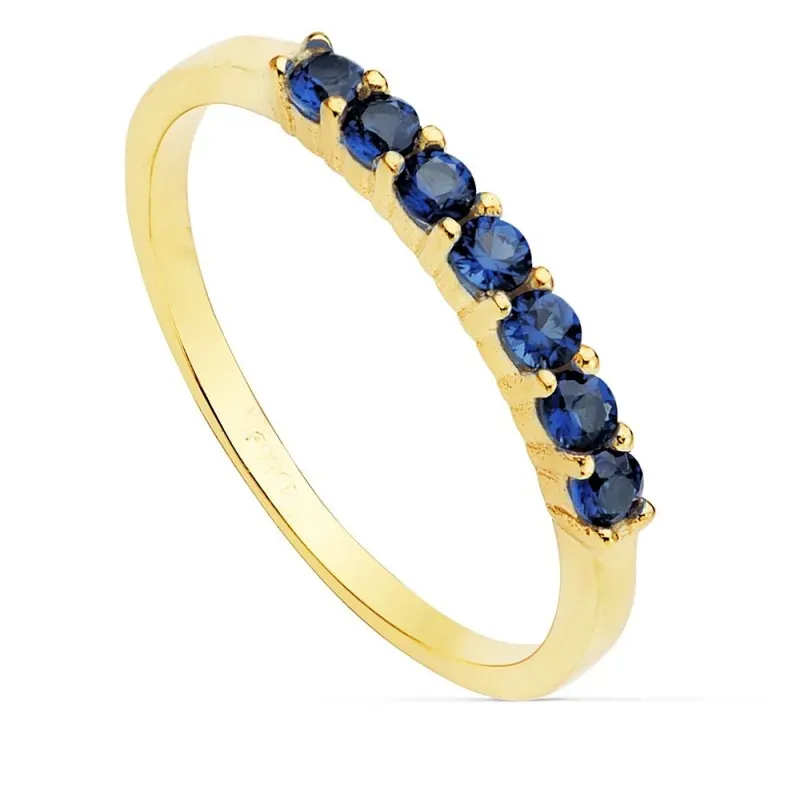 Sortija oro 18k ancho 2mm. circonitas azules mujer