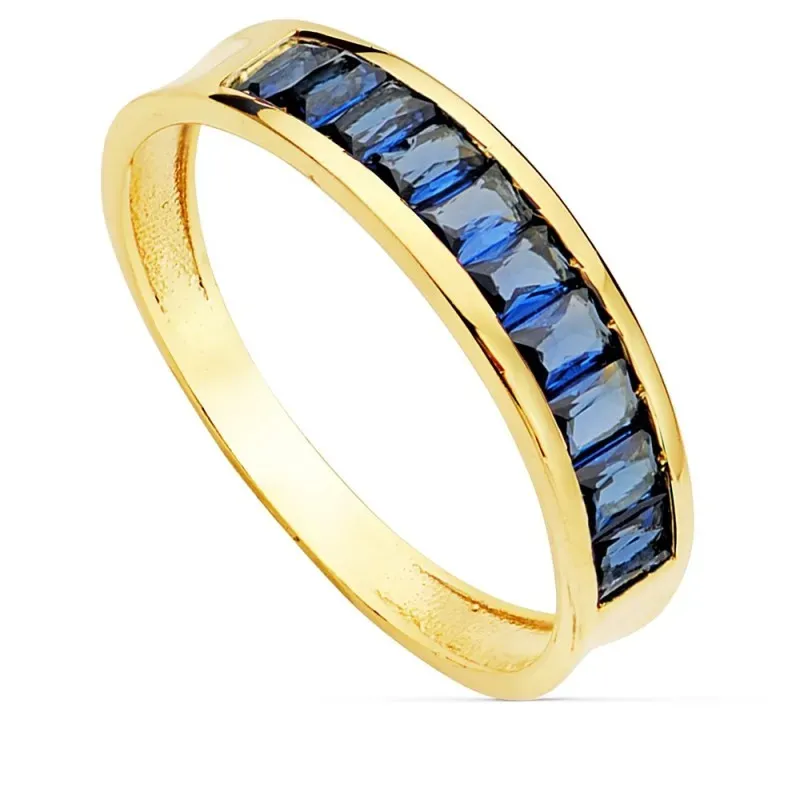 Sortija oro 18k ancho 4.5mm. circonitas azules baguette mujer