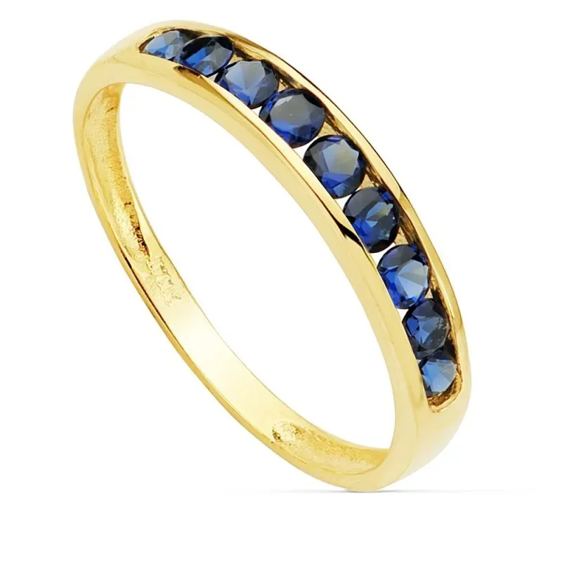 Sortija oro 18k ancho 3.5mm. carril circonitas azules mujer