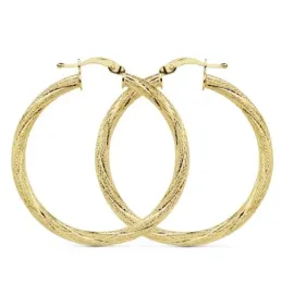 Pendientes oro 18k aros 29mm. huecos granillados cierre palillo