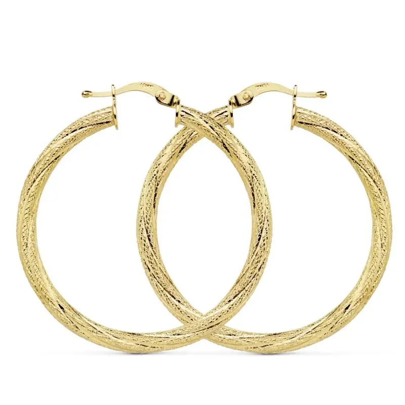 Pendientes oro 18k aros 29mm. huecos granillados cierre palillo