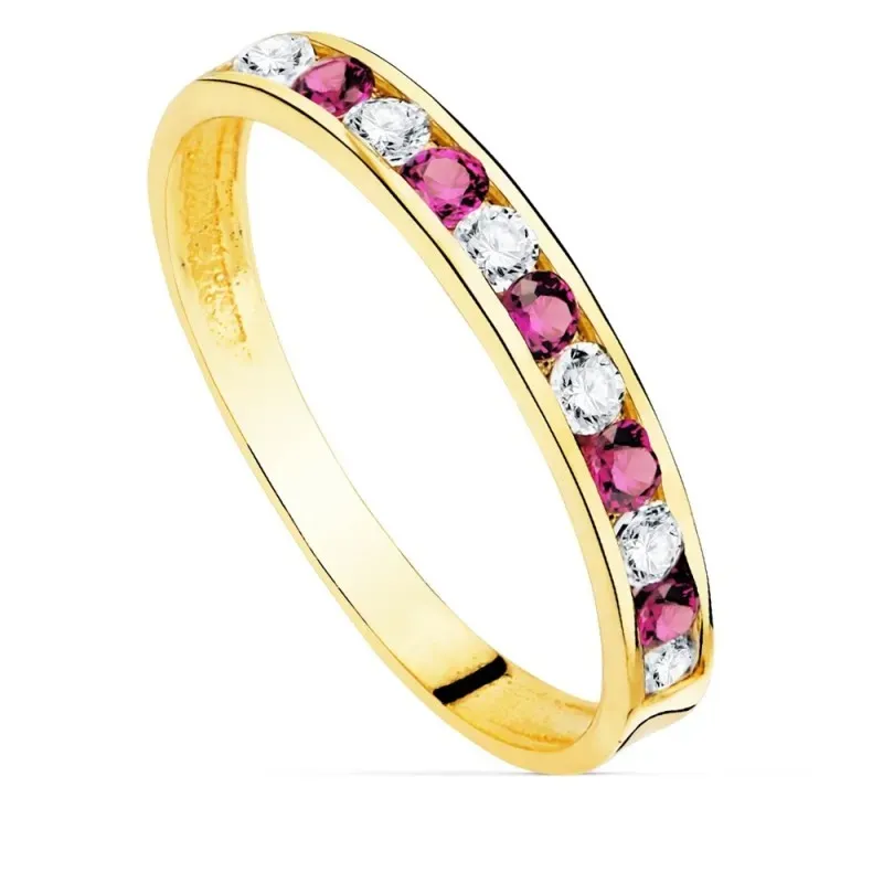 Sortija oro 18k centro carril circonitas combinadas fucsias blancas cuerpo liso