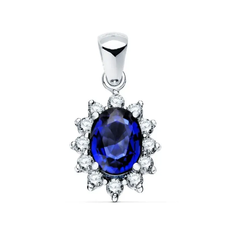 Colgante oro blanco 18k oval 13mm. centro zafiro 0.98ct. alrededor diamantes brillantes 0.35ct.