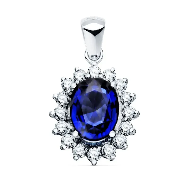 Colgante oro blanco 18k oval 14mm. centro zafiro 2.47ct. alrededor diamantes brillantes 0.42ct.