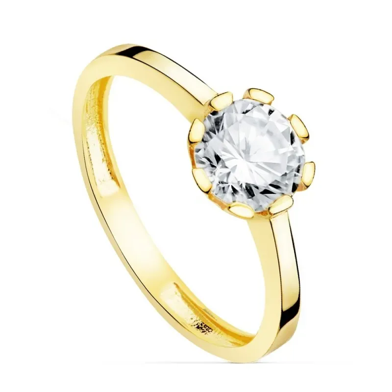 Solitario oro 18k centro circonita 6.5mm. garras liso
