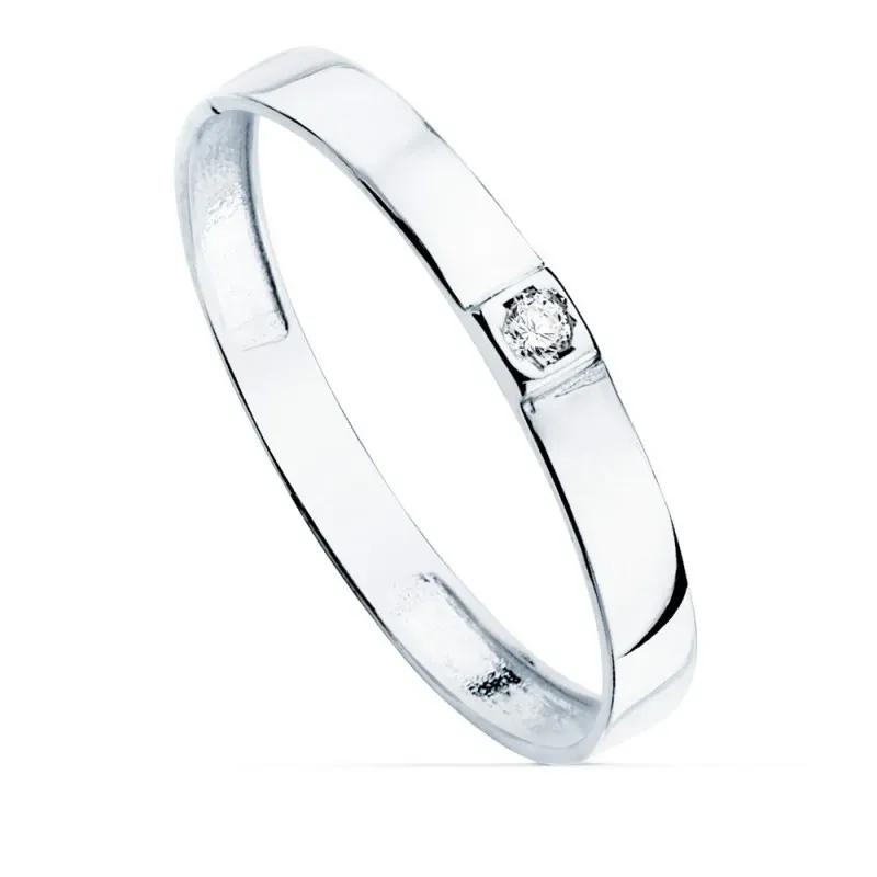 Sortija oro blanco 18k centro una circonita cuerpo 2.2mm. liso