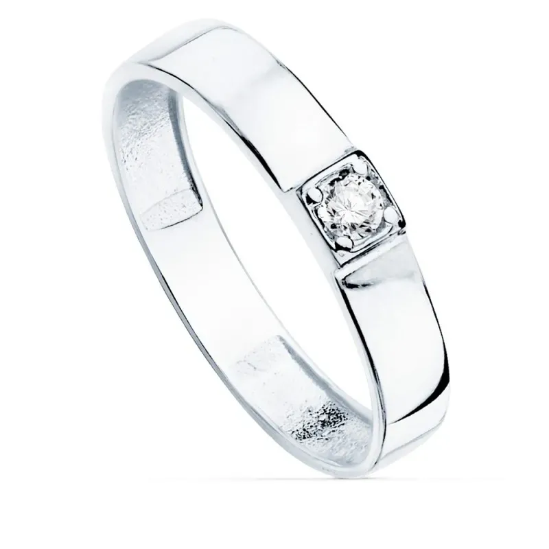 Sortija oro blanco 18k centro una circonita cuerpo 3.5mm. liso